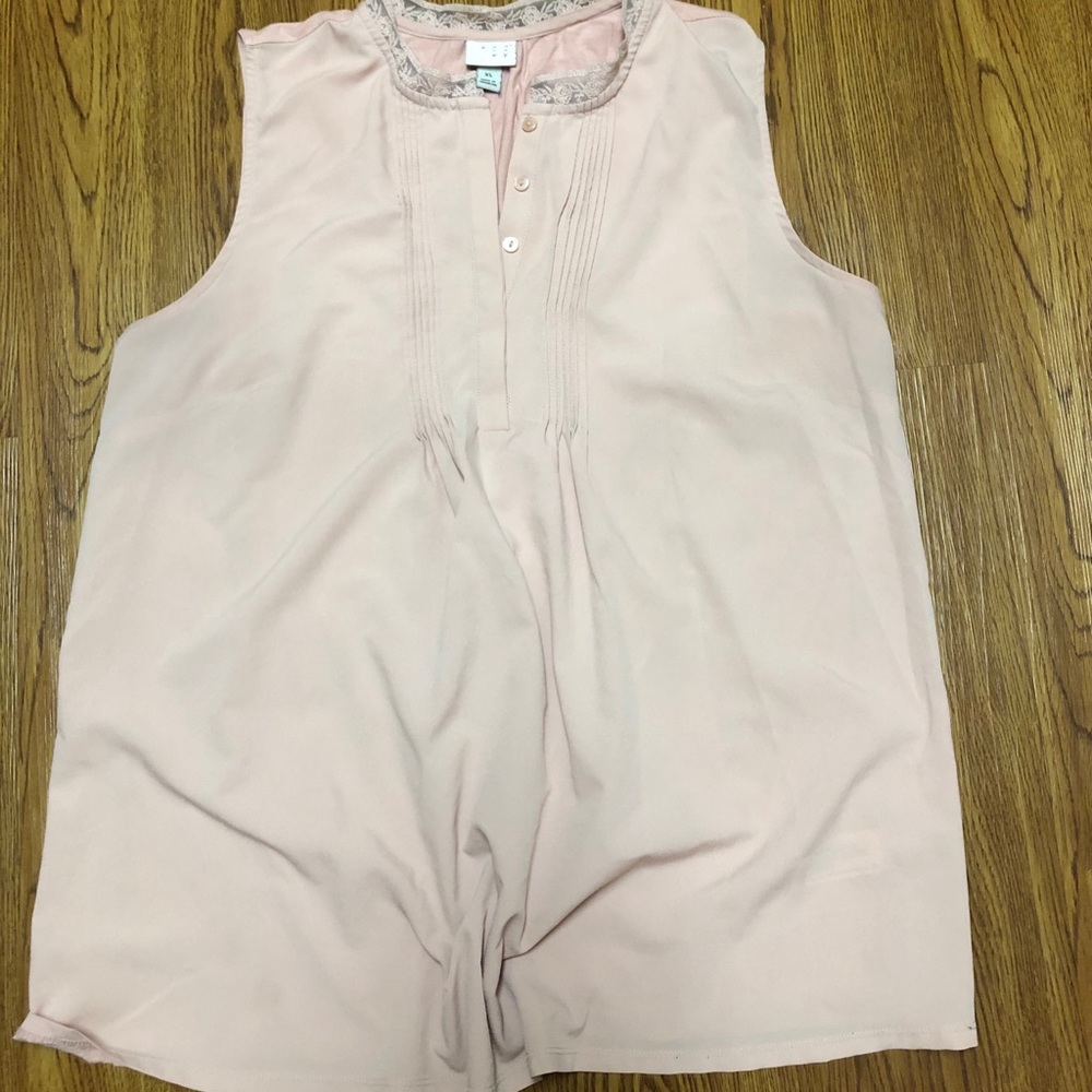 Light pink sleeveless blouse